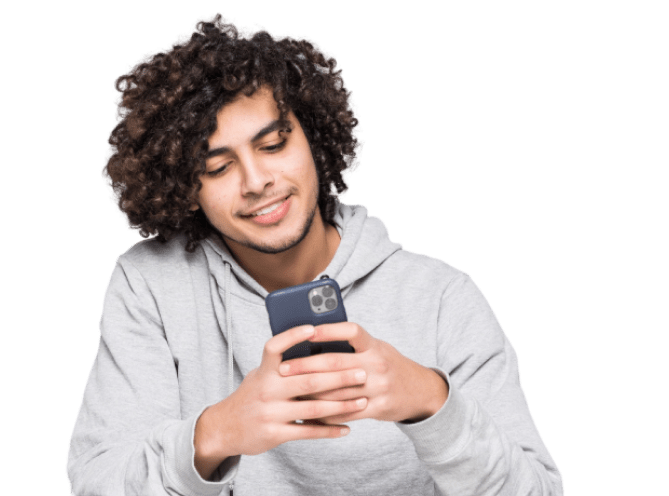 Smiling person holding a phone